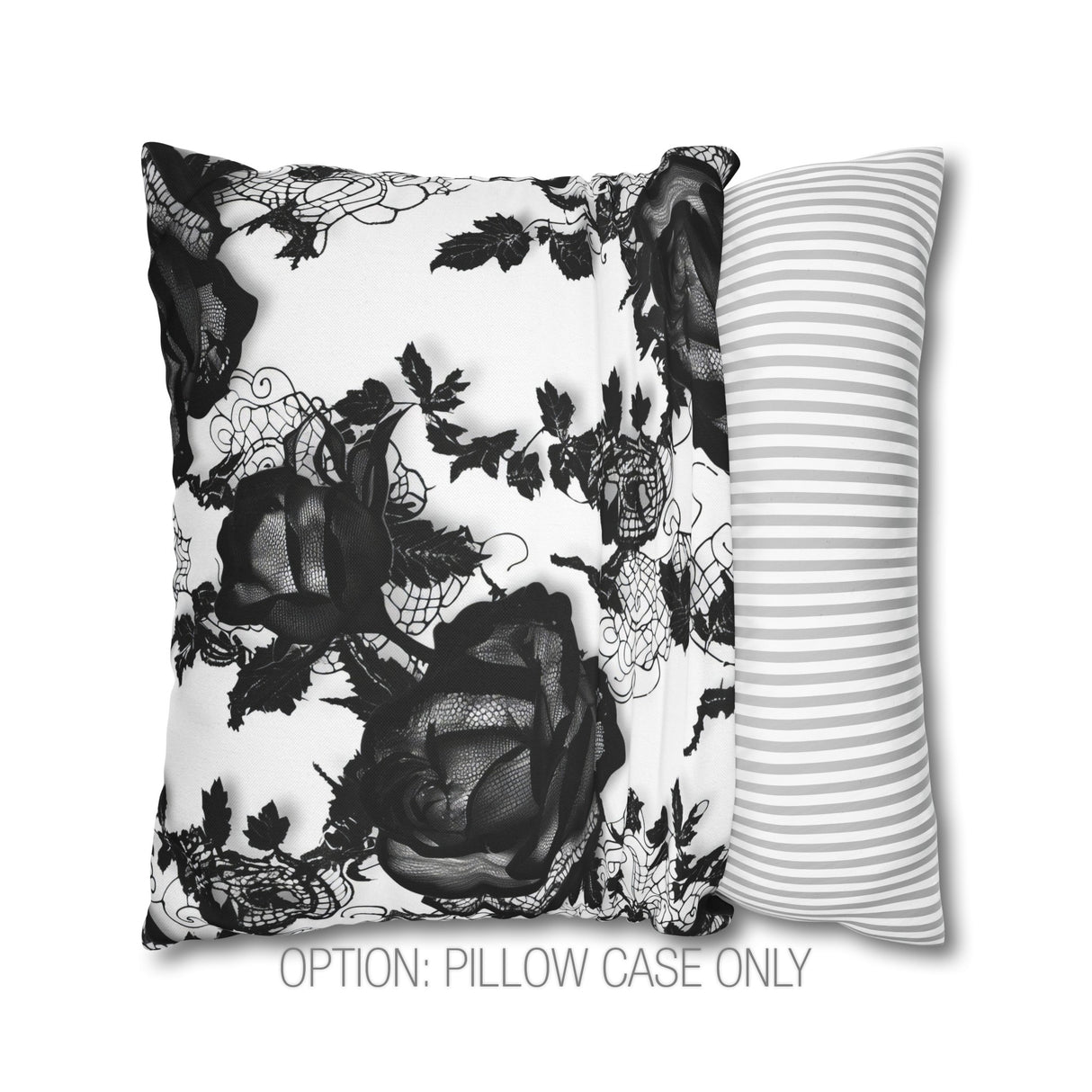 a black and white pillow with a flower on it