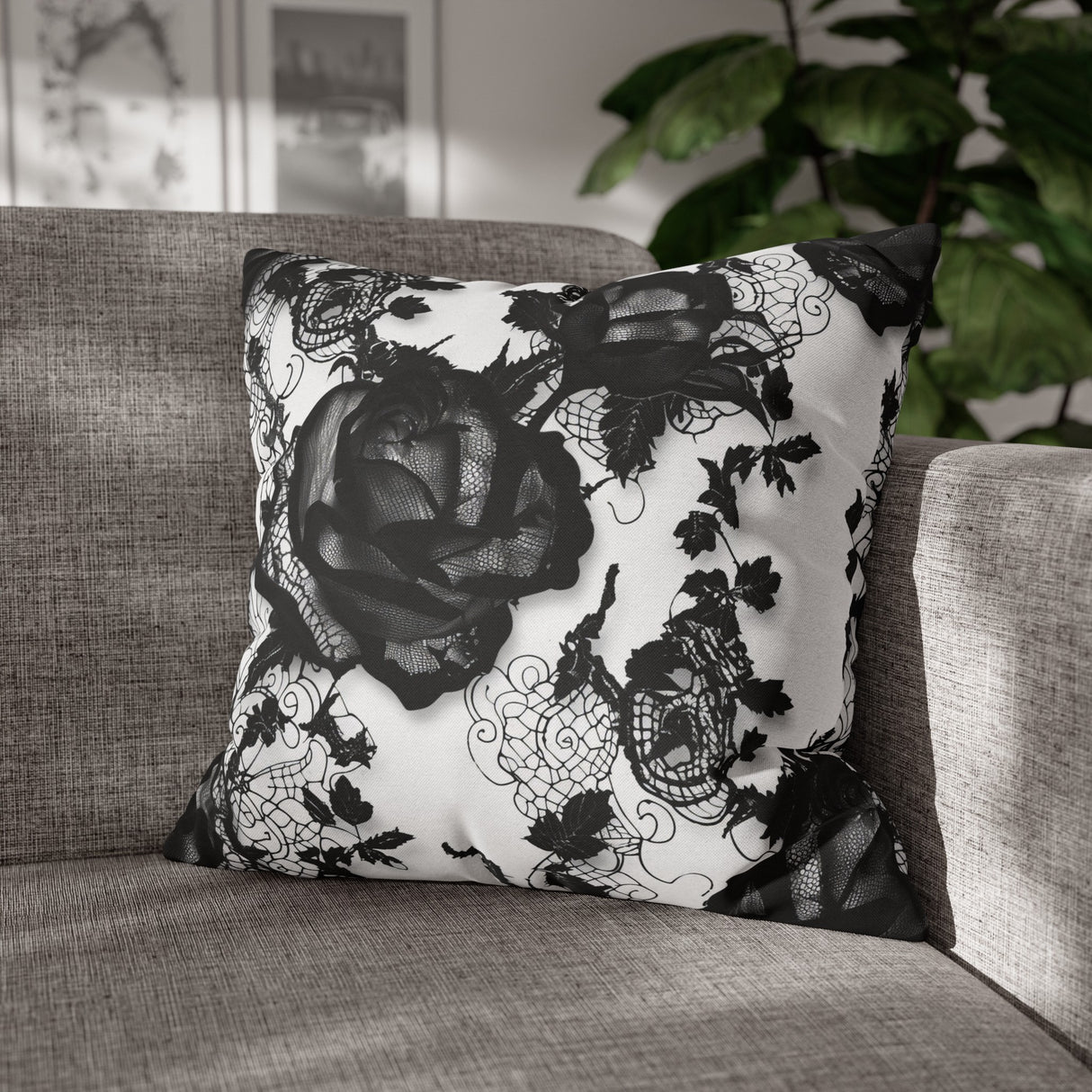a black and white pillow on a couch