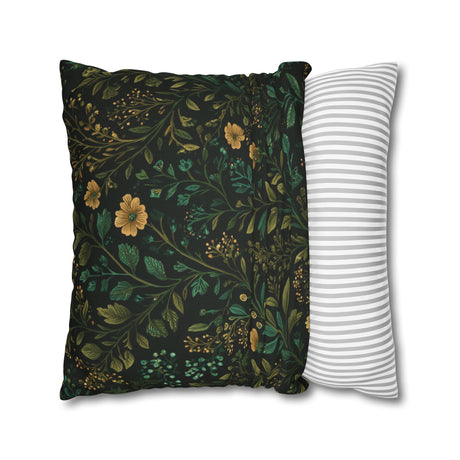 a square pillow with a green and yellow floral pattern, and a white pillow with a striped pattern placed next to it.